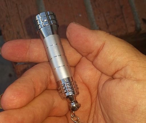  Size of product w/hand to show scale